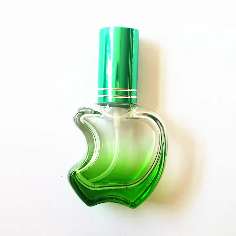 perfume in a green apple shaped bottle