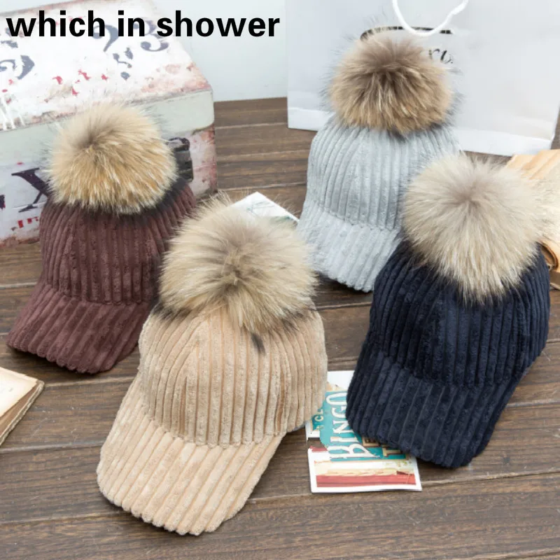 baseball cap with fur pom pom
