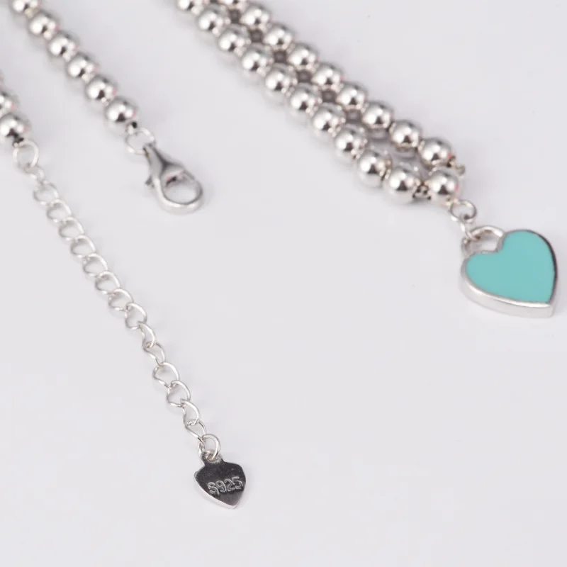 

Hot style in Europe and America's home t home with hearts enamel glue heart-shaped bracelet Female undertakes to