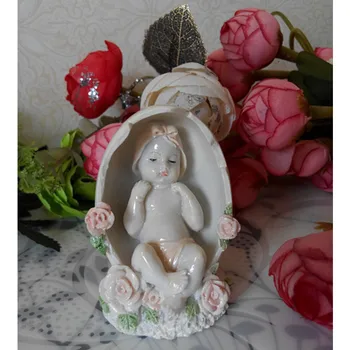 

Free shipping Sleeping Baby Angel in Egg Figures Resin toys cake car office desk home decoration shower party favor kids gifts