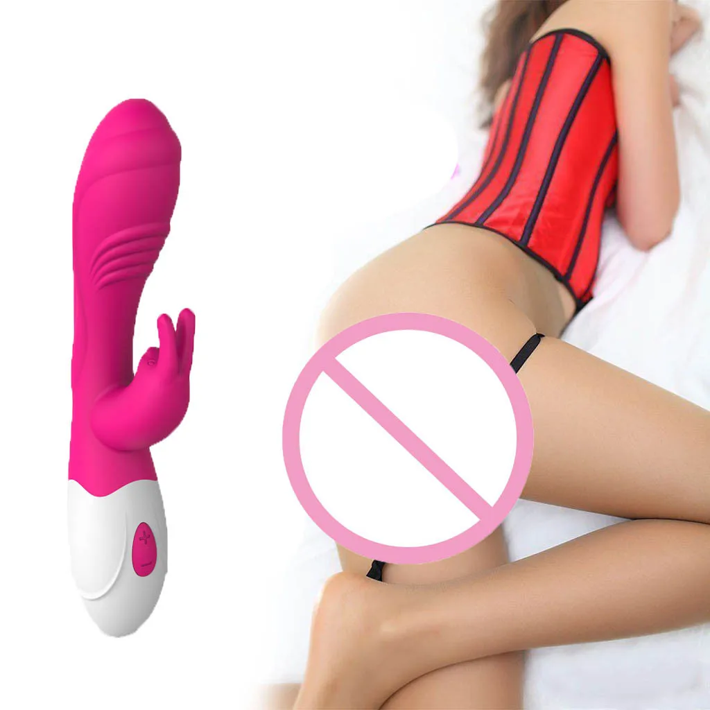 Smiling Woman Choosing And Buying Sexy Toys In The Sex Shop Stock Photo