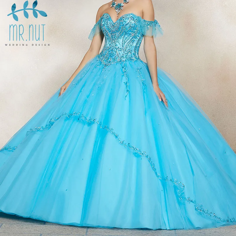 

Puffy Peach 2019 Cheap Quinceanera Dresses Ball Gown Cap Sleeves Tulle Appliques Lace Crystals Sweet 16 Dresses