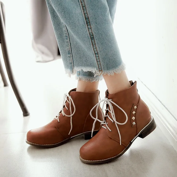 

Big Size 11 12 13 14 15 16 17 Round-headed, thick-heeled, zippered front lace, cross-strapped, short-barreled Martin boots