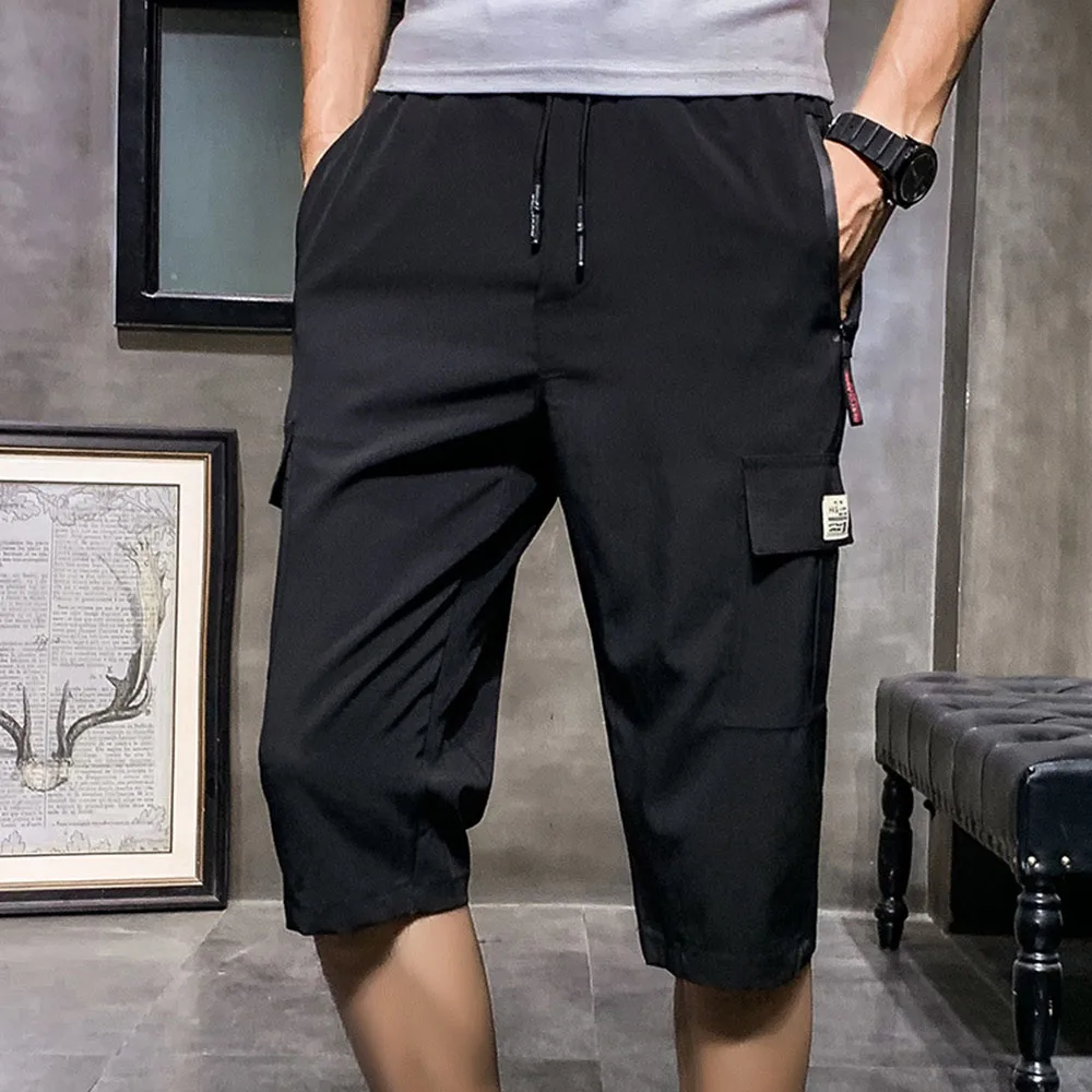 Джоггеры 2019 новые летние широкие брюки тонкие прямые повседневные свободные мужские брюки мужские 7 минут военные брюки KZ19003