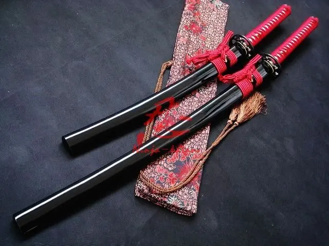

clay tempered folded steel katana/wakizashi monkey tsuba sword sharpened blade