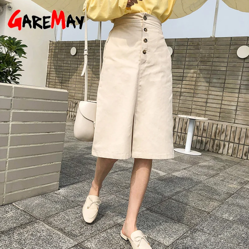 beige button skirt