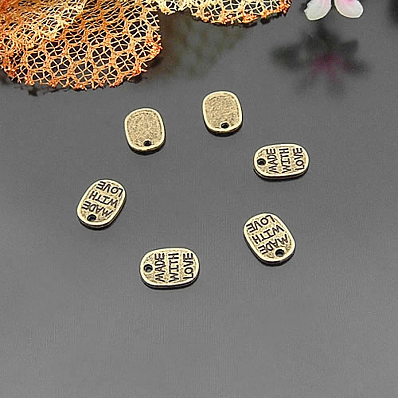 

(21786)100PCS 11x8MM Antique Bronze Zinc Alloy Made with Love Oval Charms Diy Jewelry Findings Accessories Wholesale