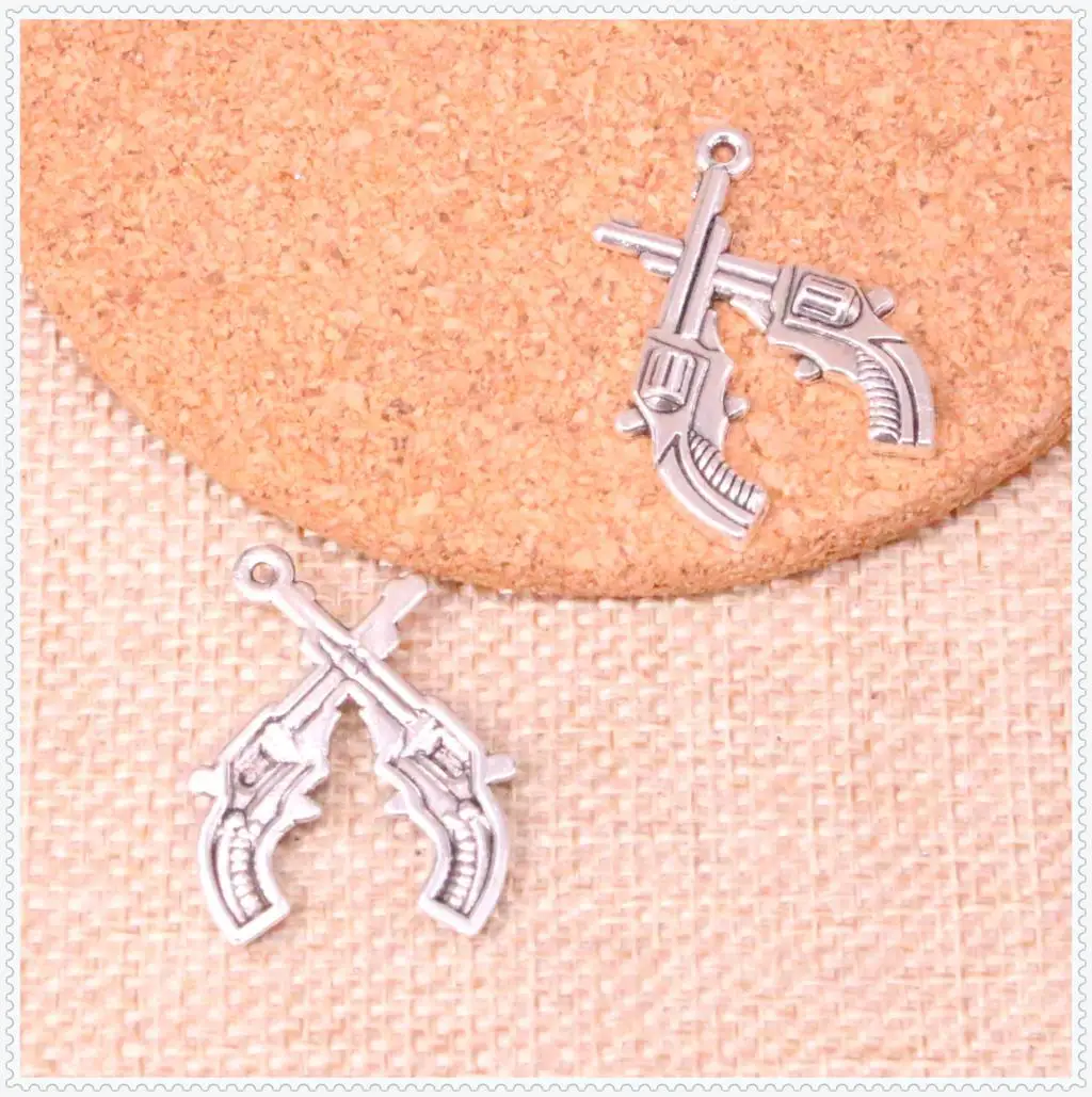 

10pcs crossed pistols revolvers western Charms Antique Silver Revolver Charm Pistol Charms Gun Charm 31*23mm