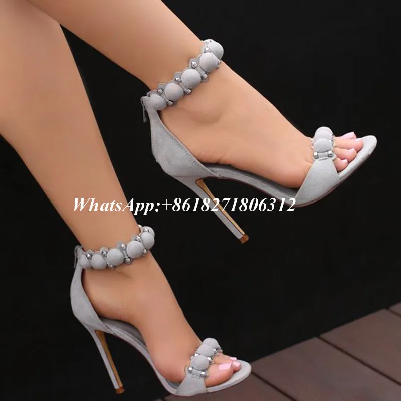 

Qianruiti Fashion Brand Rihanna Shoes Woman Suede Sandles Studded Buttoned T-Strap Bombe Pom Pom Gladiator Sandals High Heels