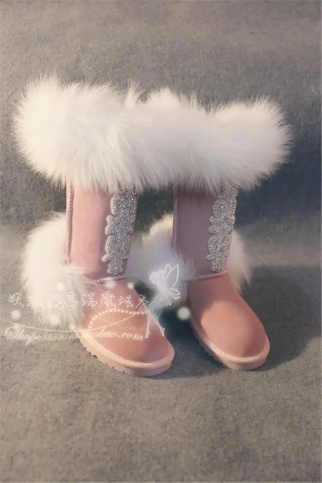 

2015 new snow boots, fox fur, leather, and high - cylinder, hand - sewn, hand - sewn boots
