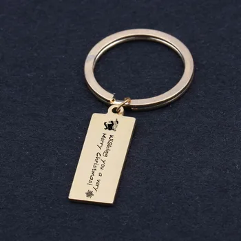 

Engraved wishing you a very merry Christmas Santa Keychains holder Celebrating Christmas presents keyring family friends car