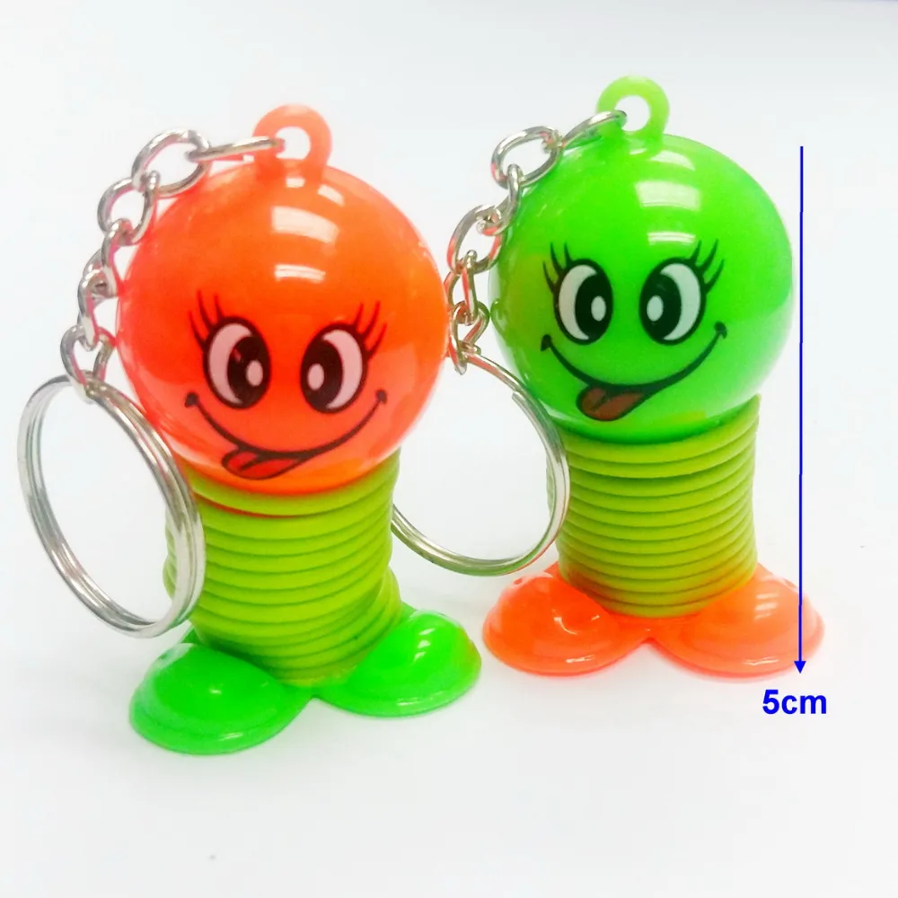 

2pc Happy smile Spring Jump Ups E465 key chain Boys Kids Toys Birthday Party Pinata Bag Filler Loot Favors Gift Prizes Novelty