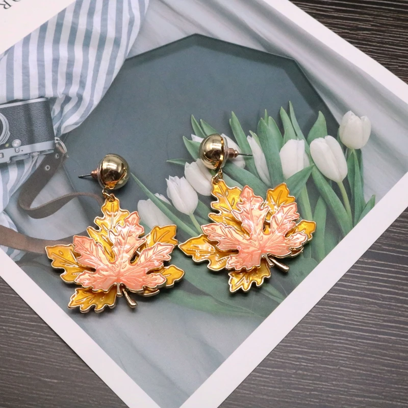 

Free Shipping Sweet Cute Maple Leaf Orange Enamel Stud Earring