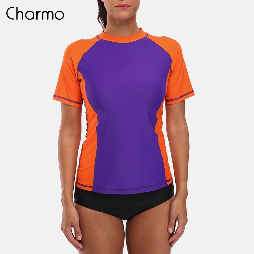Charmo النساء قصيرة الأكمام طفح الحرس قمصان Rashguard ملابس تصفح أعلى UPF 50 + تشغيل قميص ركوب الدراجات قميص ملابس السباحة بدلة ركوب الأمواج