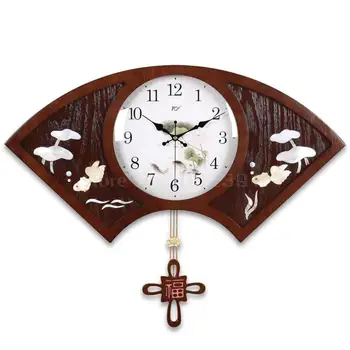 

New Chinese wood living room wall clock creative shell quartz clock fan clock clock bedroom mute watch