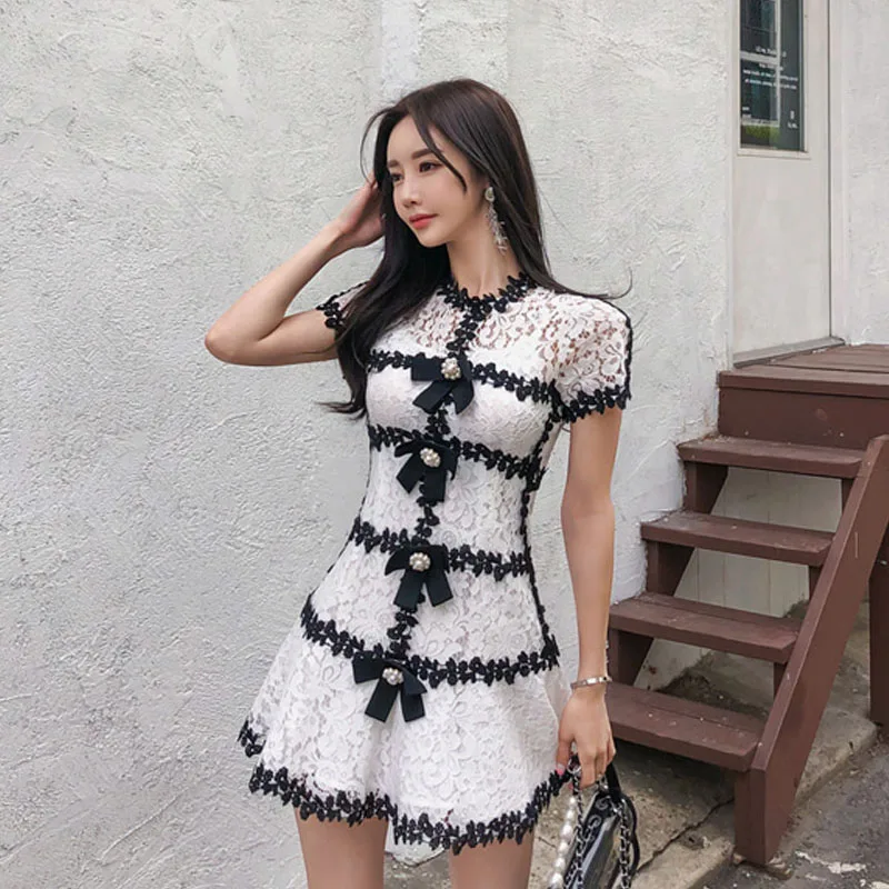 

Summer 2009 new fashion celebrity temperament hollow lace A-shaped dress with sling