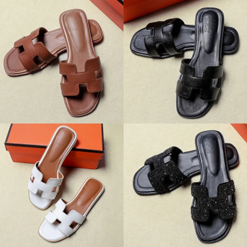 

2019 new slippers female summer fashion wear outdoor flat bottom word drag rhinestones wild sandals and slippers