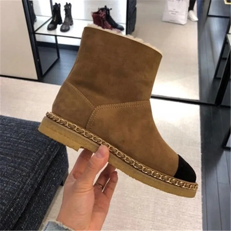 

New sheep fur one snow boots female winter warm plus velvet color matching non-slip flat bottom chain fur short boots