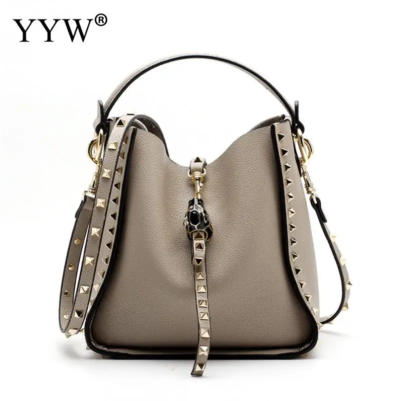 

YYW cowhide rivet handbag women large capacity easy matching bucket bag handbag studded pochette femme top handle hand bags 2019