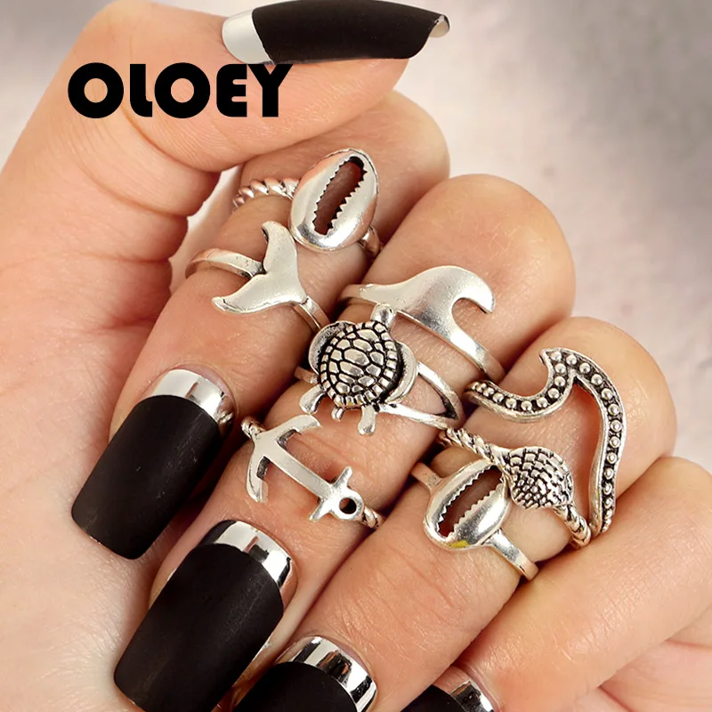 

OLOEY 8Pcs/Set Shell Sea Turtle Shark Dolphin Tail Anchor Alloy Silver Rings For Women Unisex Charm Ring Set Jewelry Anillos
