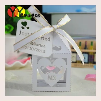 

2017 Good quality newest elegant white laser cut wedding favor fancy sweets candy box with custom tag wedding and party supply