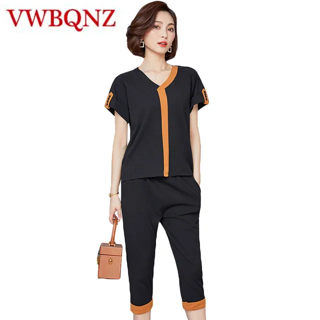 Special Price 2018 Summer New Two-piece set Women's Short-sleeved Fashion Suit Large size Loose V-neck Pullover Tops+Pants Two-piece suit 5XL Special Price 2018 Summer New Two-piece set Women's Short-sleeved Fashion Suit Large size Loose V-neck Pullover Tops+Pants Two-piece suit 5XL