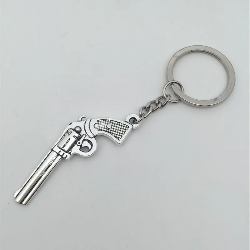 

1Pcs Gun KeyChains Ring Weapon Model Metal Key Chain Pendant