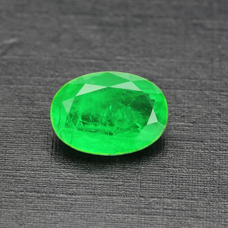 Oval shape natural crystal add glass green color and red color loose stone