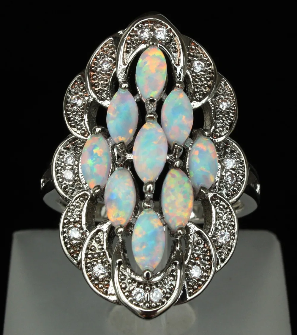 

Graceful White Fire Opal Rings for Women