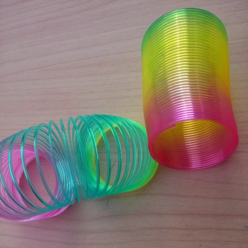 kids Magic Plastic Slinky Rainbow Spring Colorful New Children Funny Classic Toy Random color Rainbow Circle Coil Elastic ring.