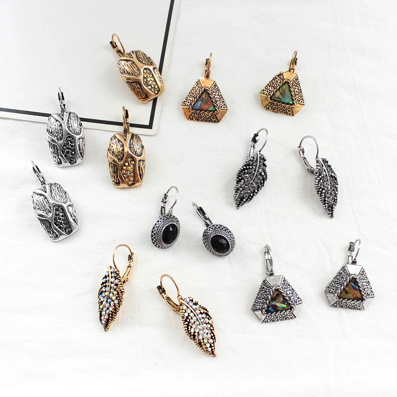 

Inlay Colored rhinestones irregular Geometric shape Leaf shape Sculpture Grain Personalized creative earrings Series set Vintag