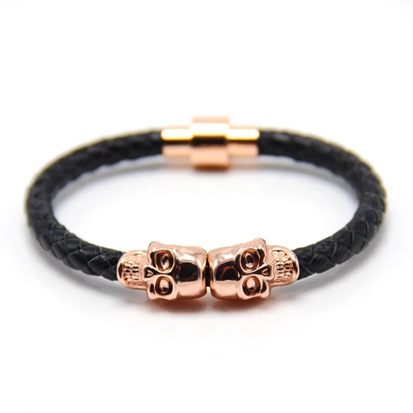 

Cool bracelet for genuine woven black leather with two skull charms magenetic clasp bracelet