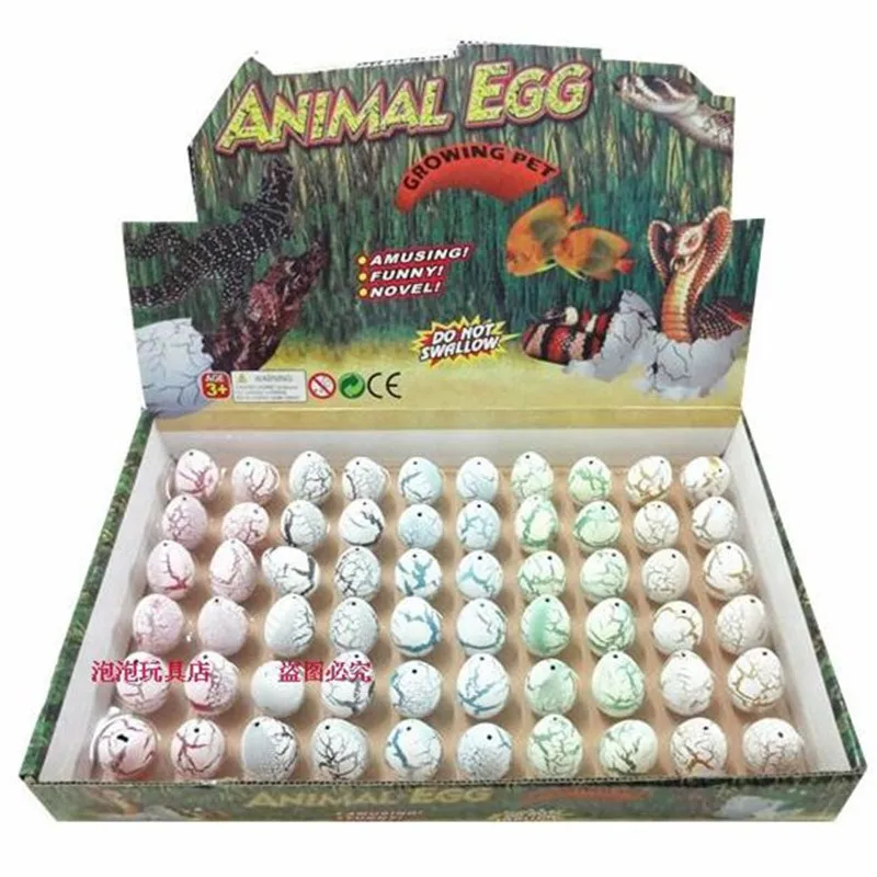 

60pcs/lot Children Gift Toys Cute Kawii Magic Eggs Growing Toys Dinosaur Eggs Small +SHOW BOX Hatching Action Figure Toys 3*2cm