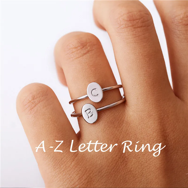 

Personalized Engraved Stackable Tiny Oval A-Z Letter Ring Hand Stamped Minimalist Initial Rings for Women Initial Jewelry