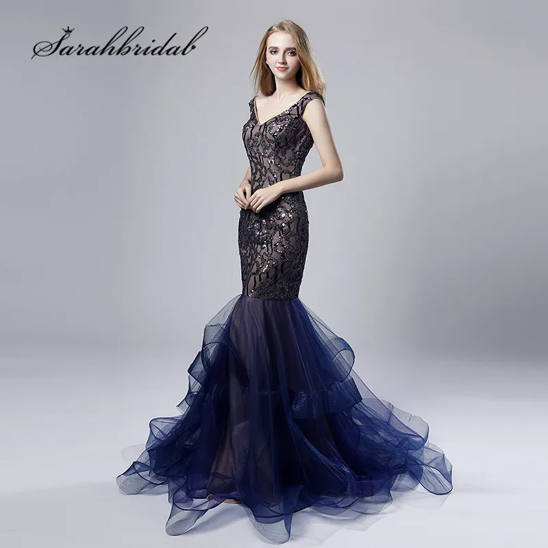 Navy Blue Evening Dresses Long Mermaid Sexy V Neck Cap Sleeves Backless Vestido de Noche Ruffles Skirt Beaded Prom Gowns CC528 Navy Blue Evening Dresses Long Mermaid Sexy V Neck Cap Sleeves Backless Vestido de Noche Ruffles Skirt Beaded Prom Gowns CC528