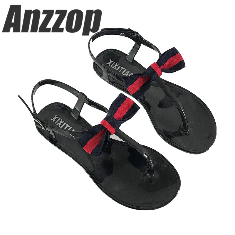 

Luxury brand women's sandals 2019 summer new bows herringbone wild England retro flat toe fashion Roman jelly beach shoes