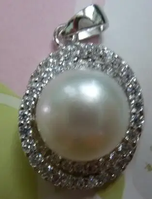 

Free shipping 1pcs big natural pearl pendant 11-12mm diameter pearl pendant with silver very beautiful