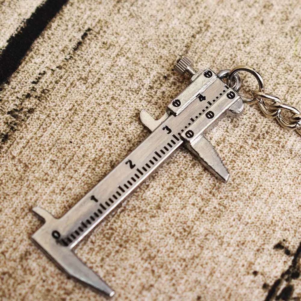 

1 pc Dropshipping Metal Moving Vernier Caliper Ruler Model Keychain Keyfob Tool Gift kumpas ring ruler Straight Rulers