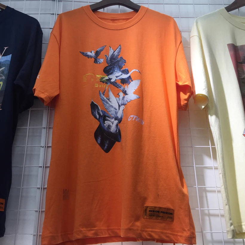 

Heron Preston T-shirt Orange Men Cotton High Quality Casual Street Tshirt Flying Pigeon Heron Preston T Shirt