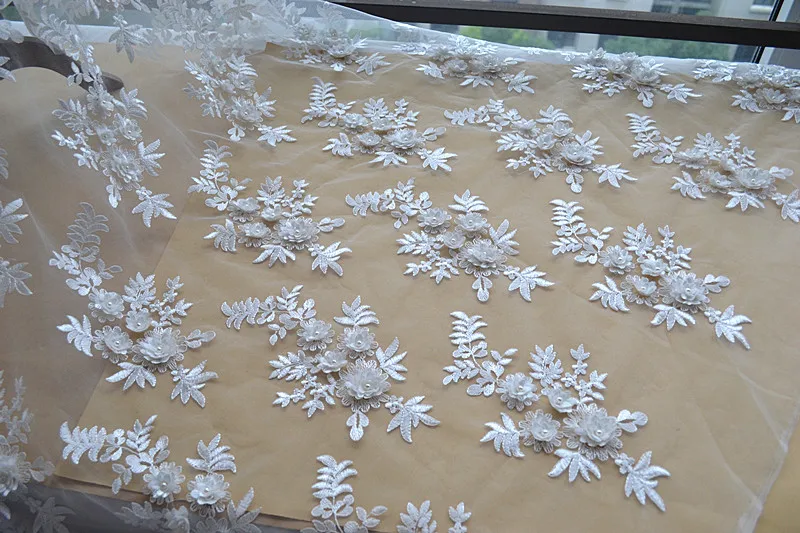 

Luxurious 3d fabric flowers beaded ivory lace fabric embroidered high quality Rayon material wedding gowns lace material latest
