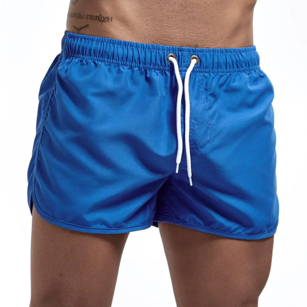 JOCKMAIL мужские пляжные шорты для серфинга, одежда для плавания, пляжные шорты для мужчин, летние мужские спортивные шорты для бега, для спортзала, мужские однотонные шорты, 14 цветов - Цвет: Синий