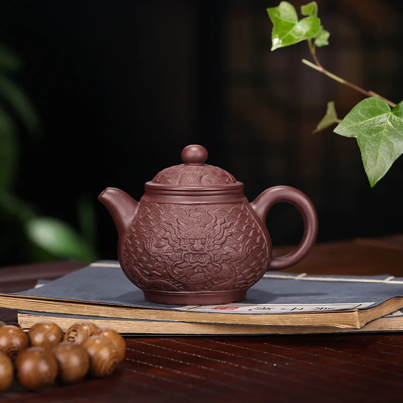 

Yixing Yixing Tea Set Goods Raw Ore Purple Ink For Imprinting Of Seals Relief Dragon Shaped Pan Pot