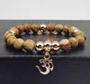 OM de Metal con pulsera elástica de cuentas, cuerda ► Foto 3/4