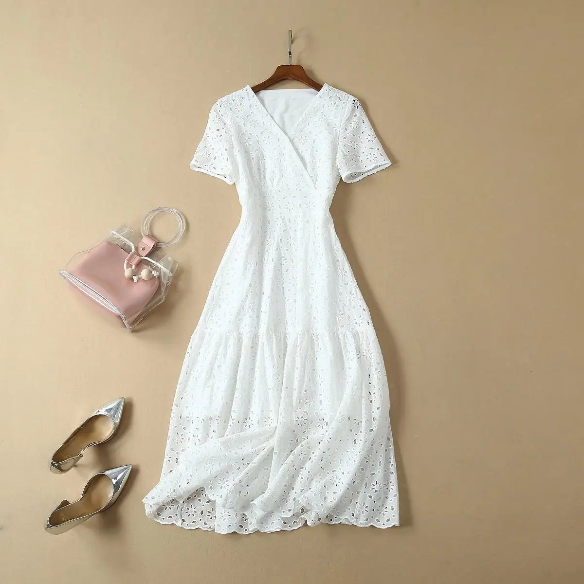 

In the 2019 summer new hollow out long v-neck cotton dress