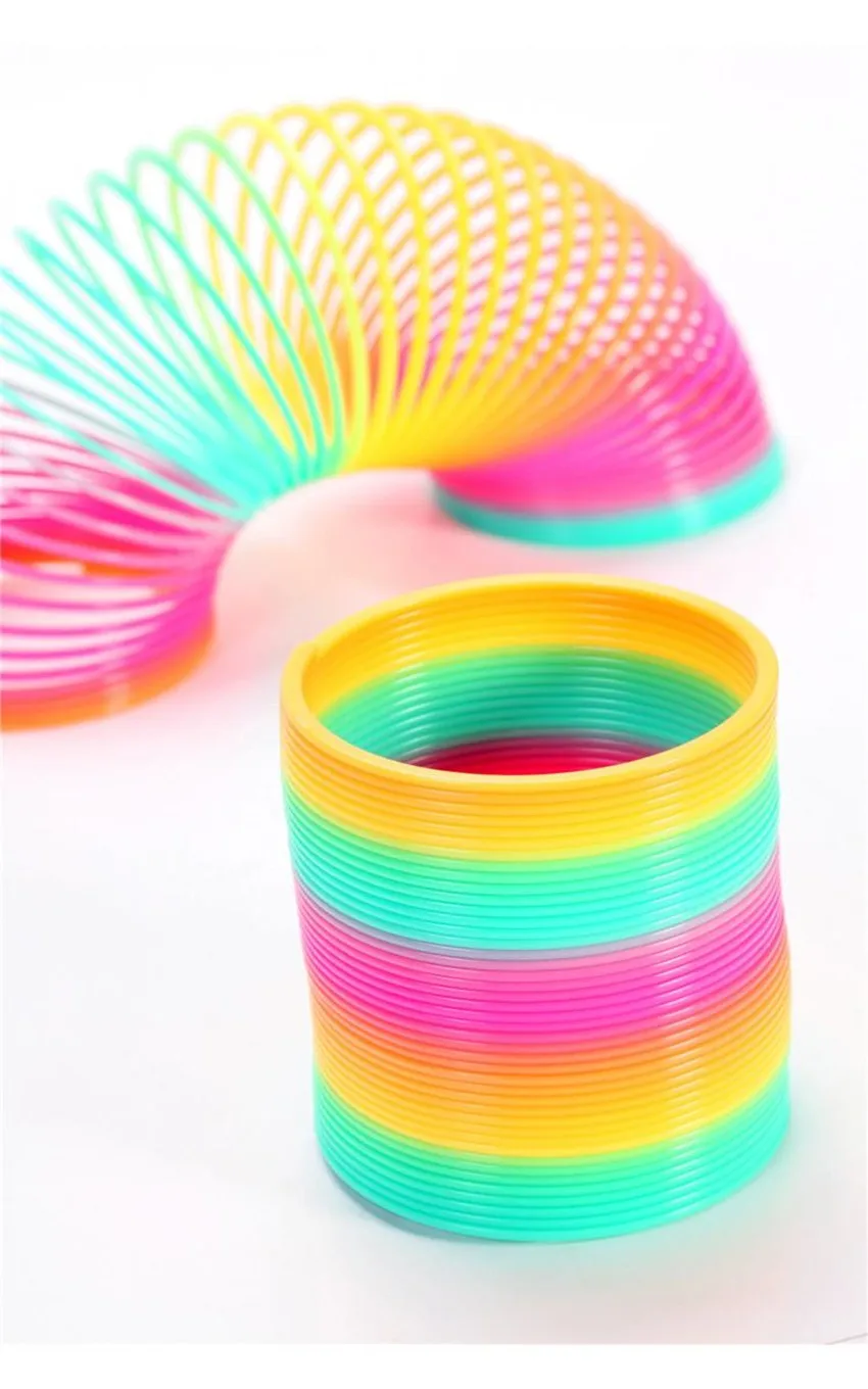 5 X GLOW IN THE DARK RAINBOW SPRING COIL SLINKY FUN TOY STRETCHY BOUNCING 7CM 