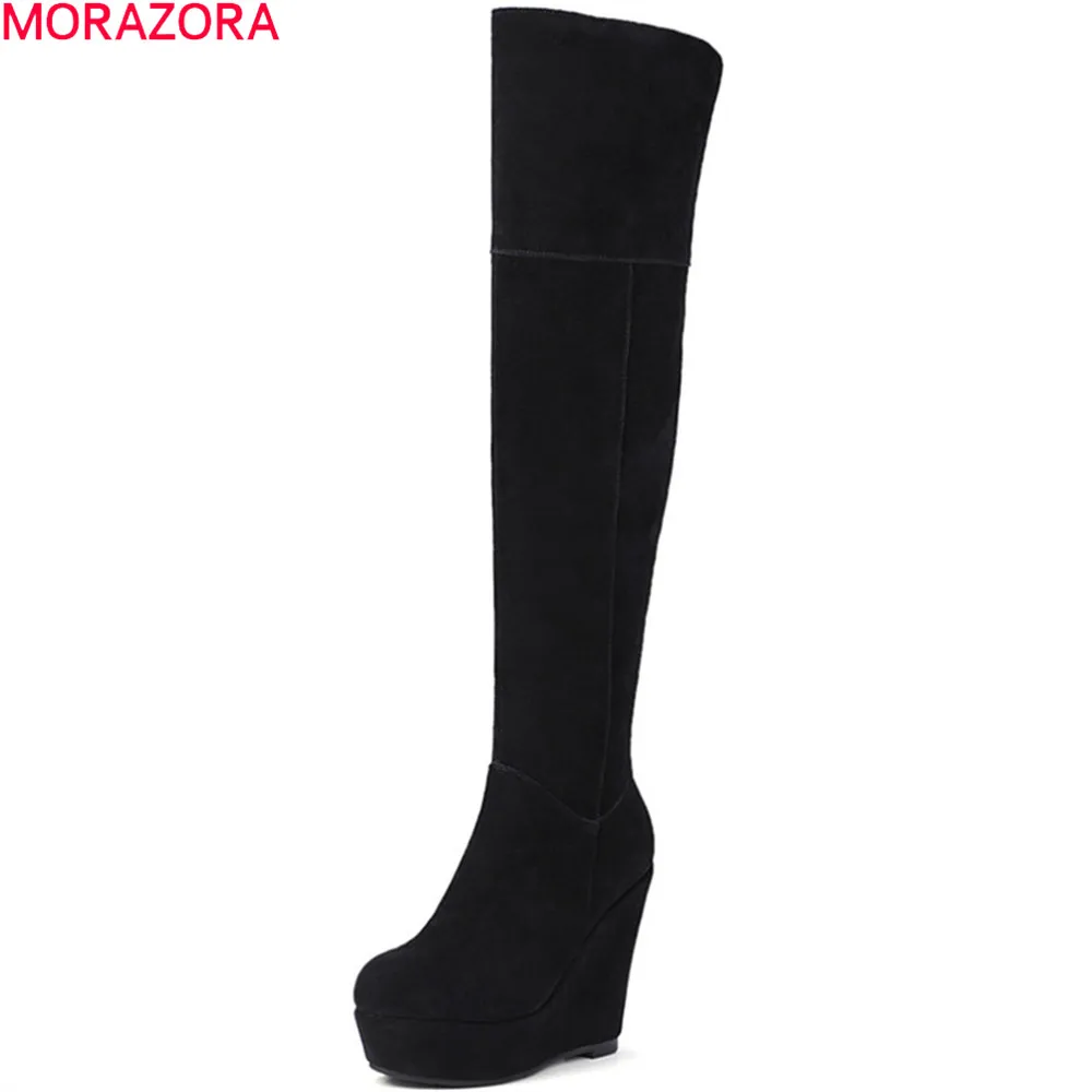 black wedge over the knee boots