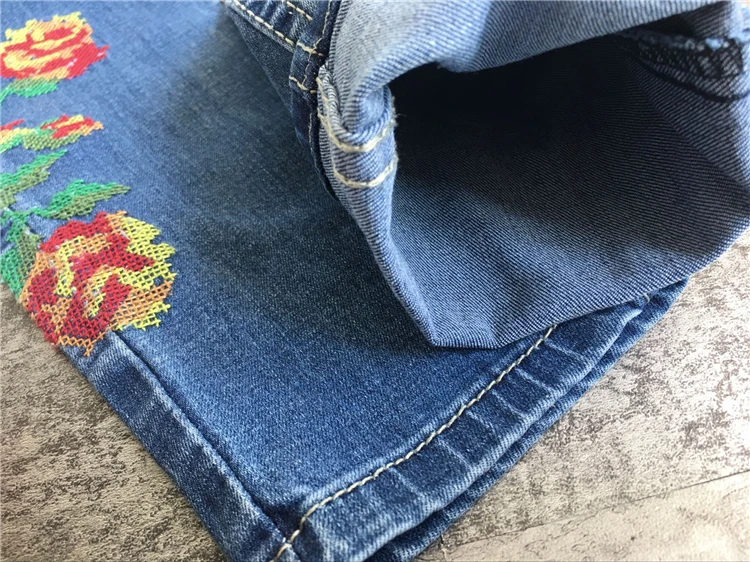 2017 European and American women's high waist elastic front and rear side of the cross embroidery roses washed cat to be cowboy pants pants pants (23)
