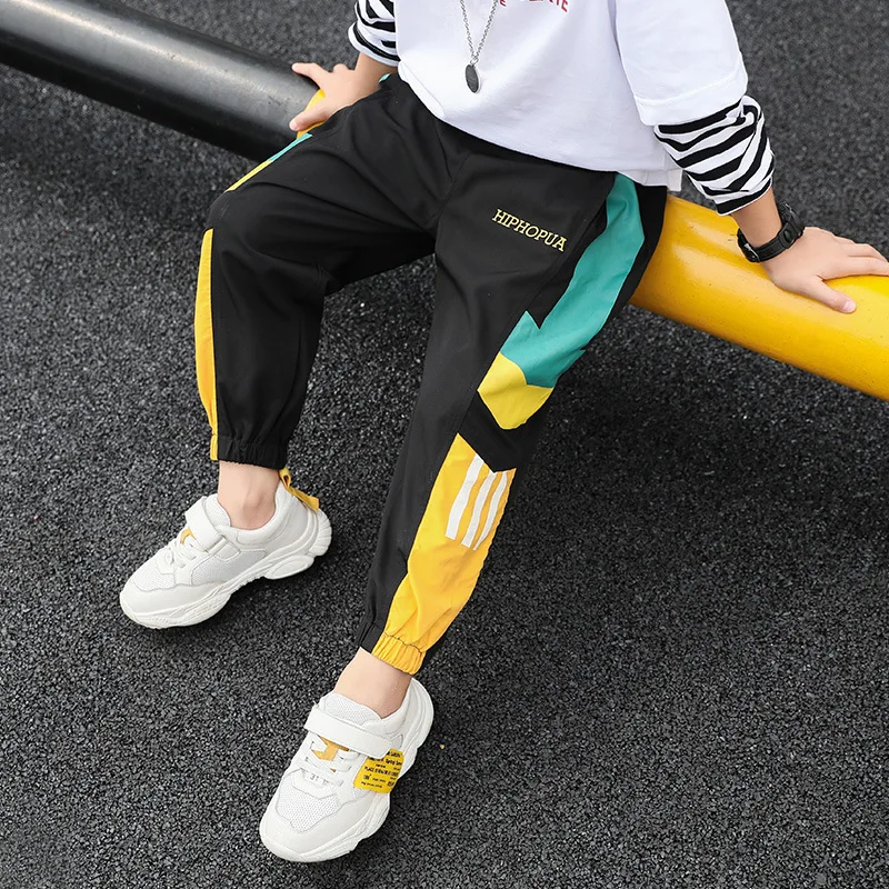 

2019 spring and autumn new children's clothing boys color matching printed sweatpants children's long pants