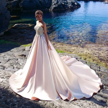 

Optcely Luxury Strapless Zipper A-line Wedding Dresses 2019 New Illusion Vintage Beading Bridal Gowns Customized Plus Size