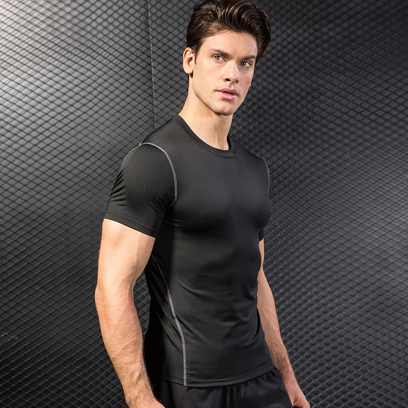 

Hot Fast Drying Shirt Sport Compression Men Running Fitness Shirt Tight Guard Eruption Football Shirt Basketball Gym Sportswear